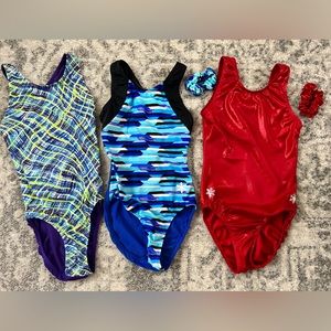 Three Snowflake Design gymnastic leotards with two matching scrunchies